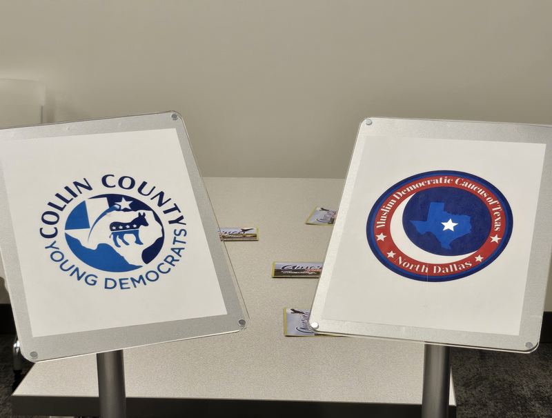 Two table signs side by side: the Collin County Young Democrats logo and the MDCND seal